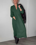 Long V-neck midi dress in dark green with black jacket, three-quarter sleeves