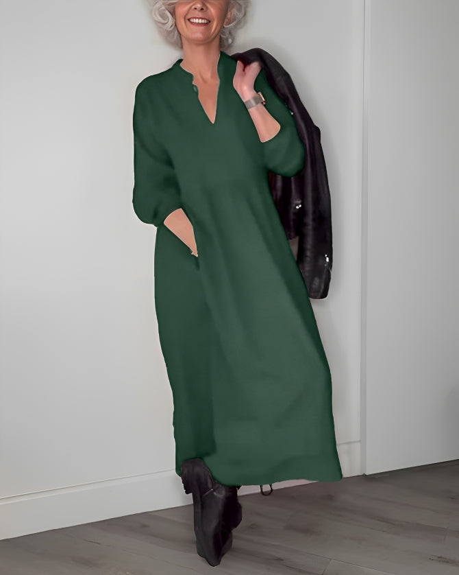 Long V-neck midi dress in dark green with black jacket, three-quarter sleeves