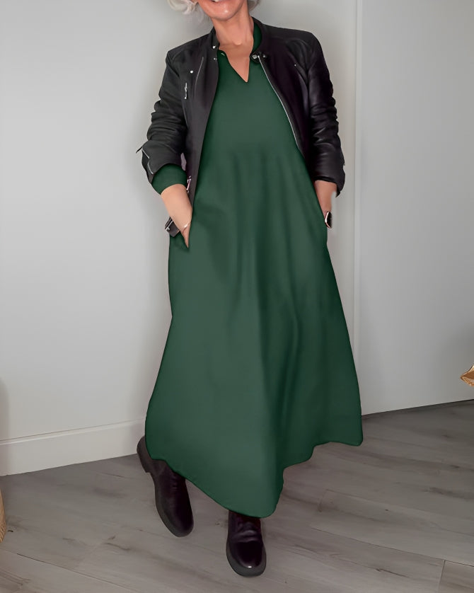 Long V-neck midi dress in dark green with black jacket, three-quarter sleeves