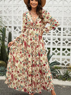 Floral tiered maxi dress with V-neck and long sleeves in cream, pink, and green