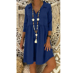 Blue cotton blouse dress with V-neck and elbow-length sleeves, gathered skirt