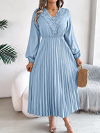 Light blue pleated midi dress with V-neck lace trim and long balloon sleeves