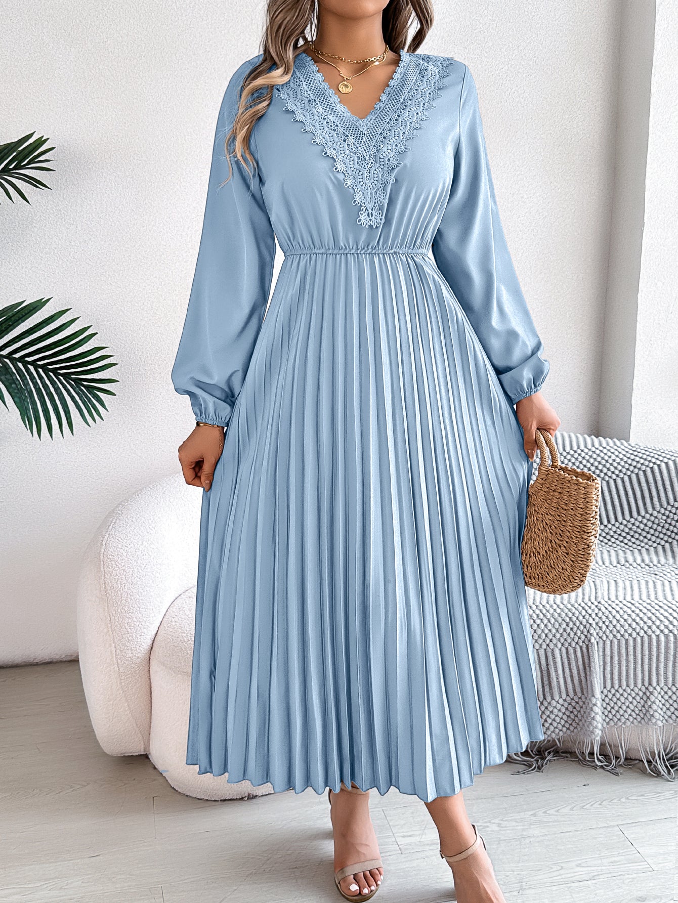 Light blue pleated midi dress with V-neck lace trim and long balloon sleeves
