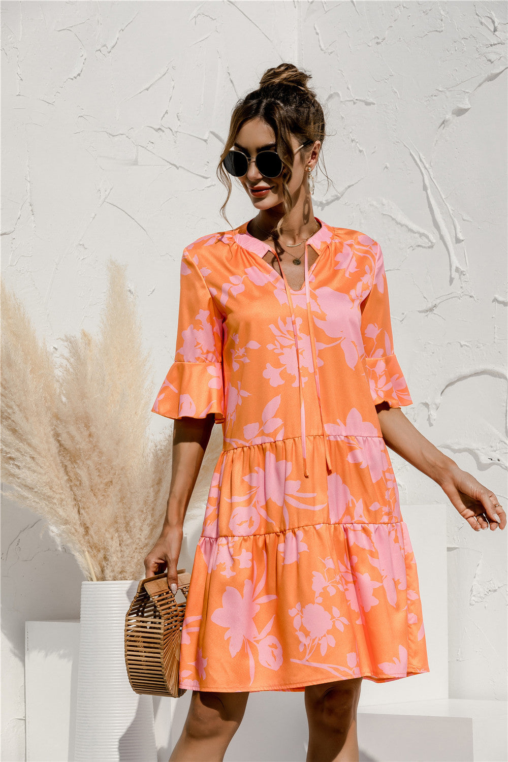 MONA summer dress in peach with orange floral print, V-neck, short ruffled sleeves