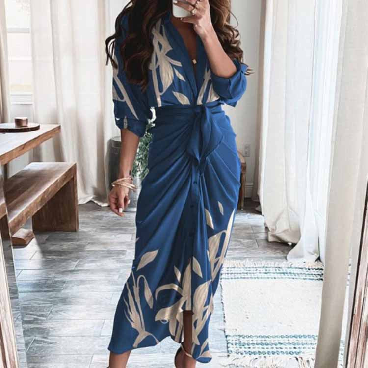Wrap midi dress with waist tie, button front, navy blue with light botanical pattern