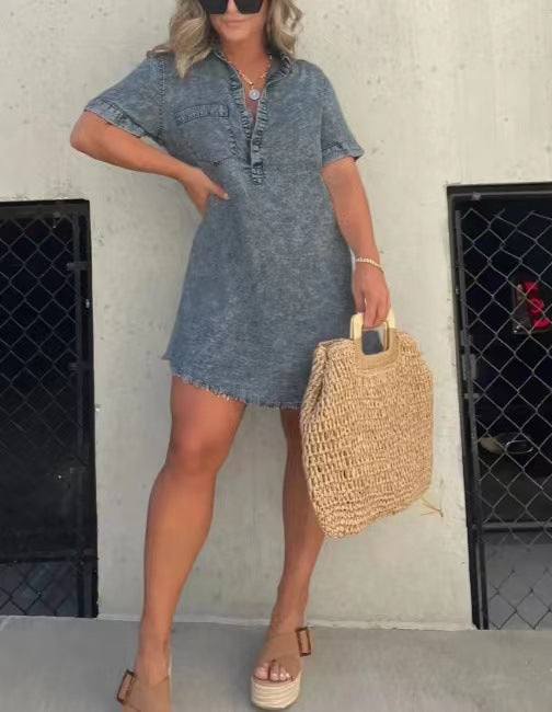 Blue-gray denim-style casual dress with button placket, short sleeves, and frayed hem
