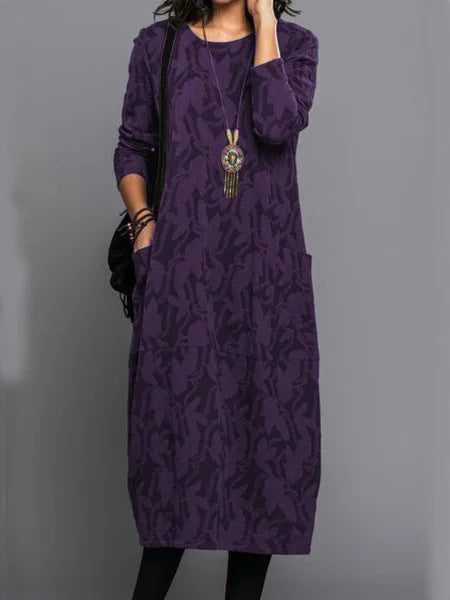 Stylish long purple dress with abstract foliage pattern, long sleeves, round neckline