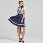 Blue and white folk dress, side view, floral top with corset lacing and navy skirt