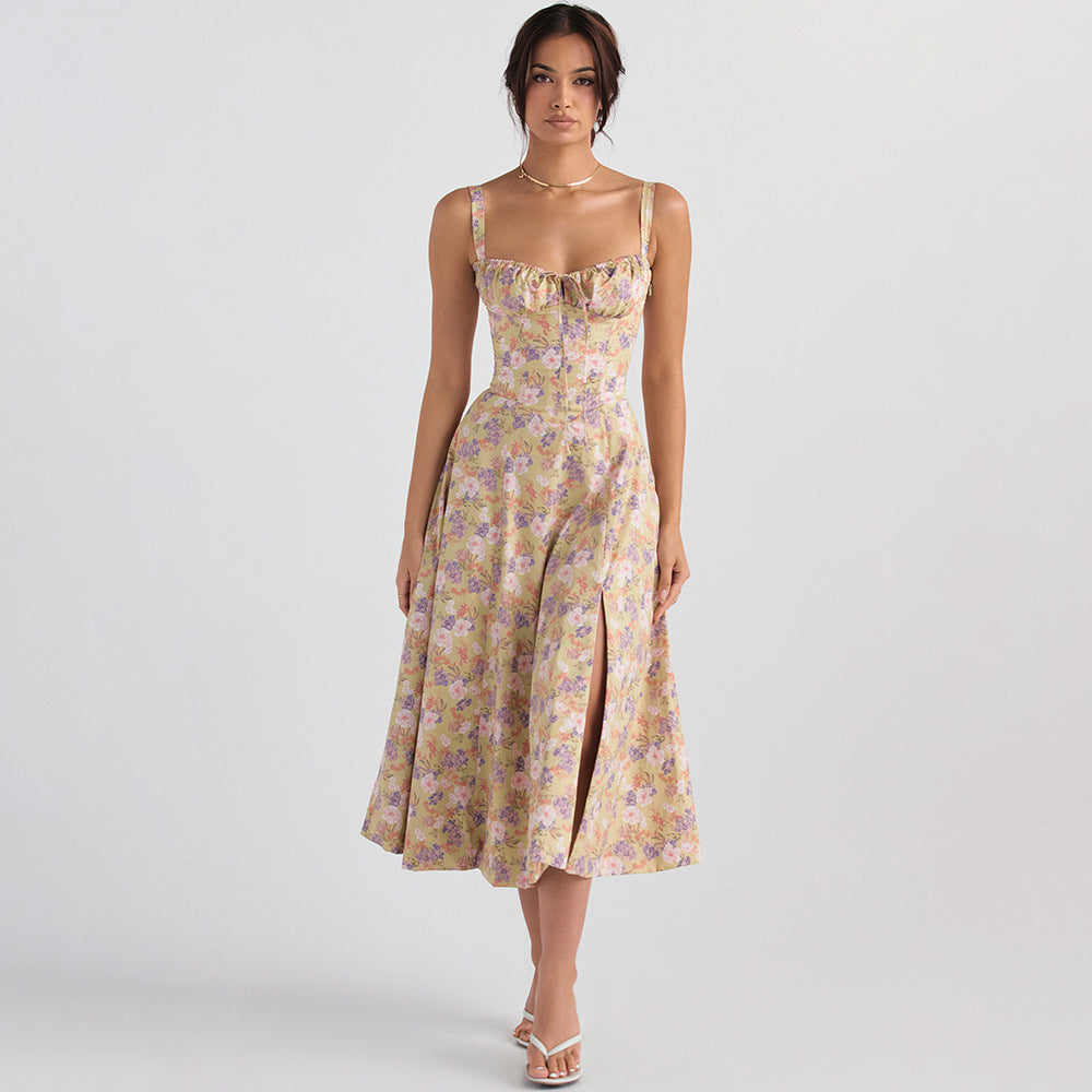 Elegant midi dress in yellow floral print with ruched bust and spaghetti straps