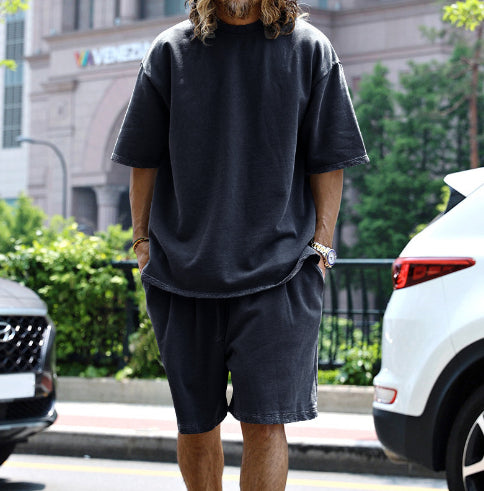 Black relaxed summer set: short-sleeve T-shirt and knee-length shorts