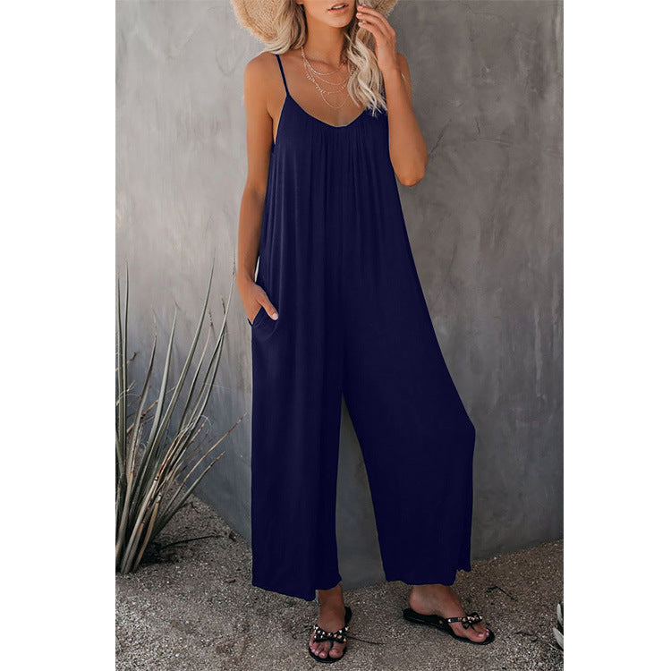 Navy loose-fitting jumpsuit with spaghetti straps and wide-leg pants