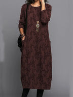 Stylish long wine red dress with abstract foliage pattern, long sleeves, round neckline