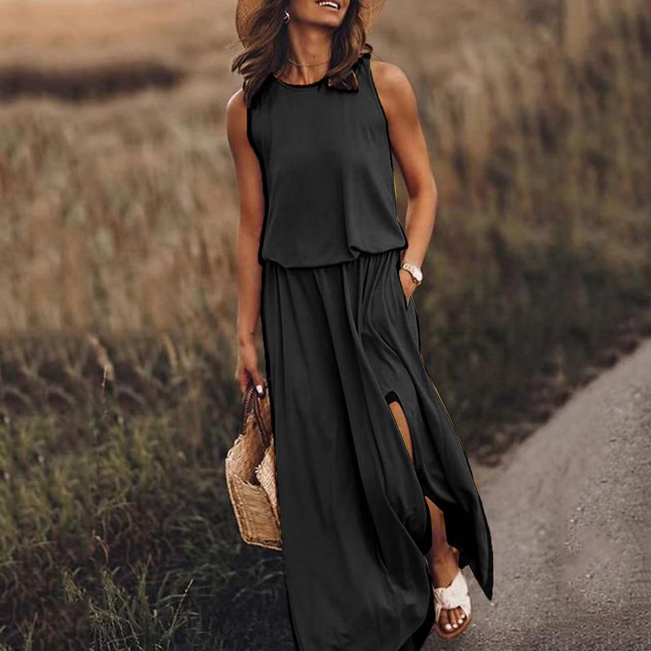 Sleeveless summer dress, black tiered bodice with loose skirt and side slit