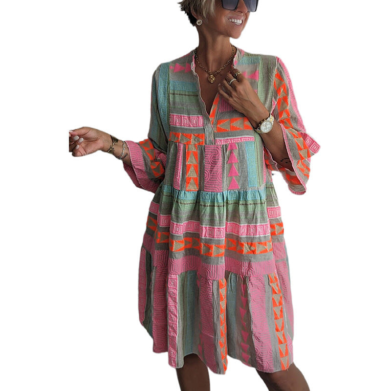 Women's patchwork summer dress with V-neck and tiered hem, long sleeves and ruffled details