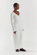 White ribbed V-neck midi dress, long sleeves, side view with vertical stripes