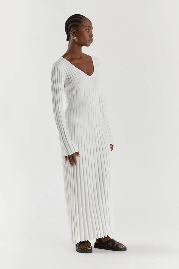 White ribbed V-neck midi dress, long sleeves, side view with vertical stripes