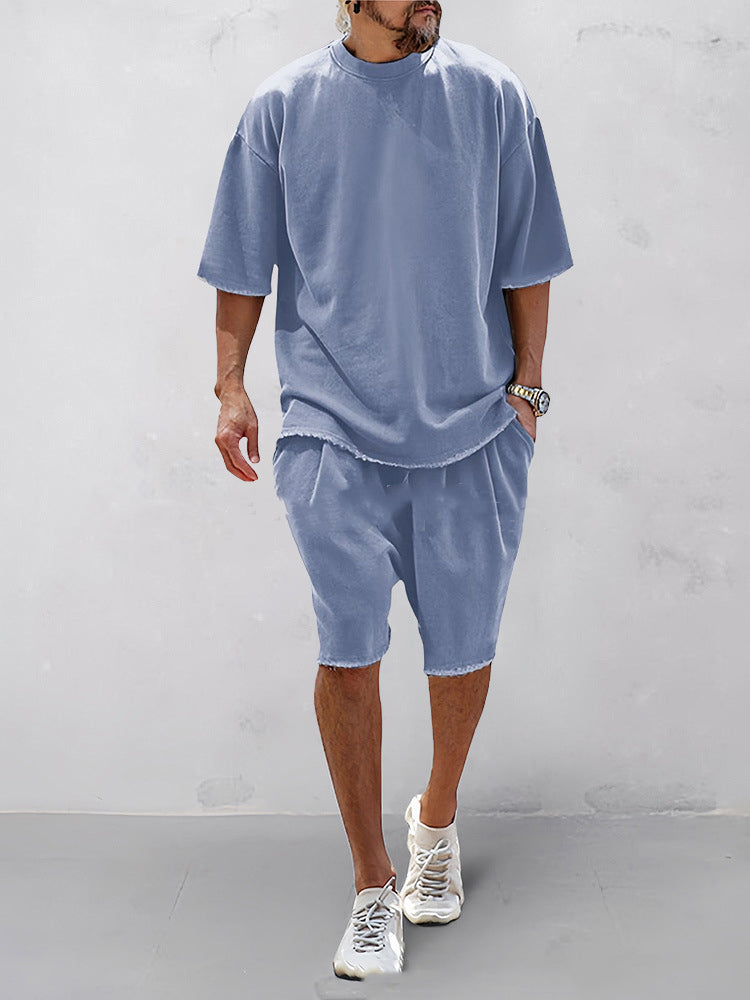Light blue relaxed summer set: short-sleeve T-shirt and knee-length shorts