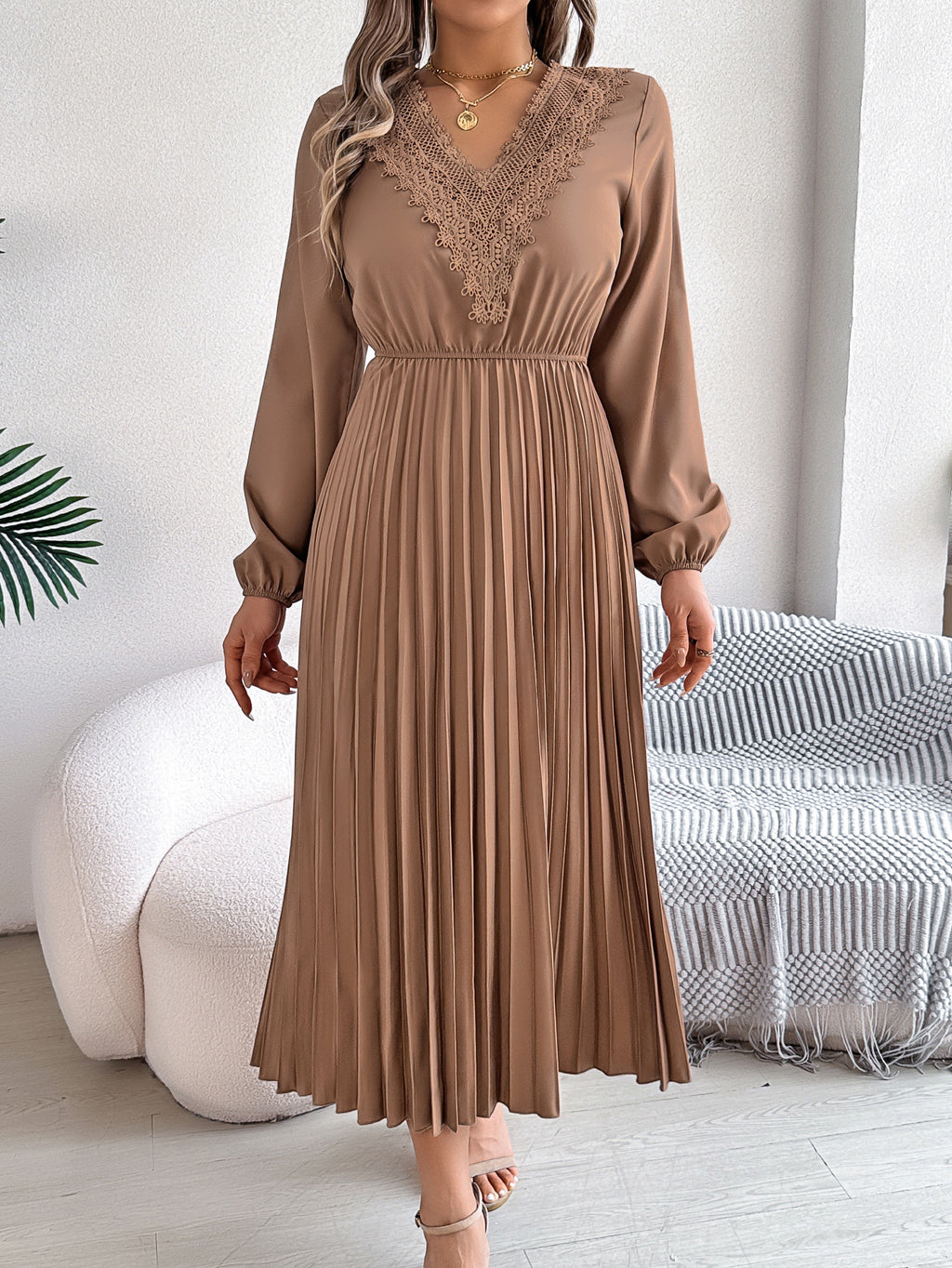 Pleated midi dress with long sleeves, V-neck, and lace trim in taupe