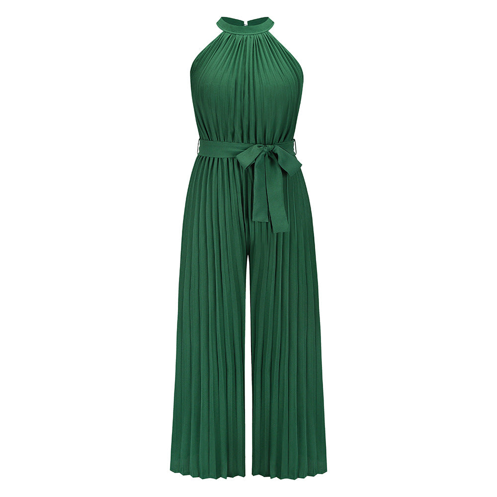 Green pleated halter jumpsuit with tied waist and wide-leg pants