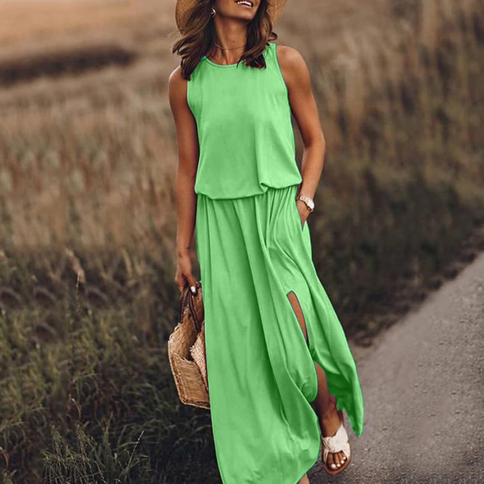 Sleeveless summer dress, bright green tiered bodice with loose skirt and side slit