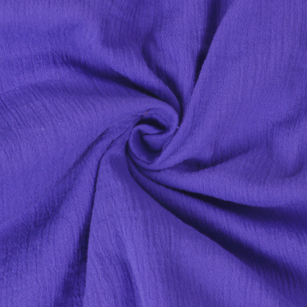 Purple textured fabric swatch with soft crinkle look