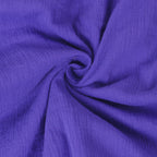 Purple textured fabric swatch with soft crinkle look