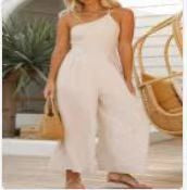 Ivory halter-neck wide-leg jumpsuit with smocked bodice and elastic waist