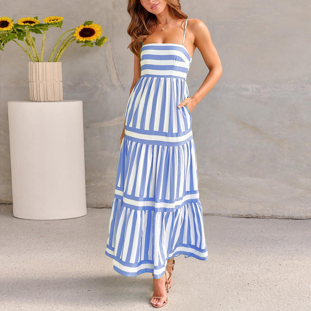 Blue and white striped tiered maxi dress with spaghetti straps