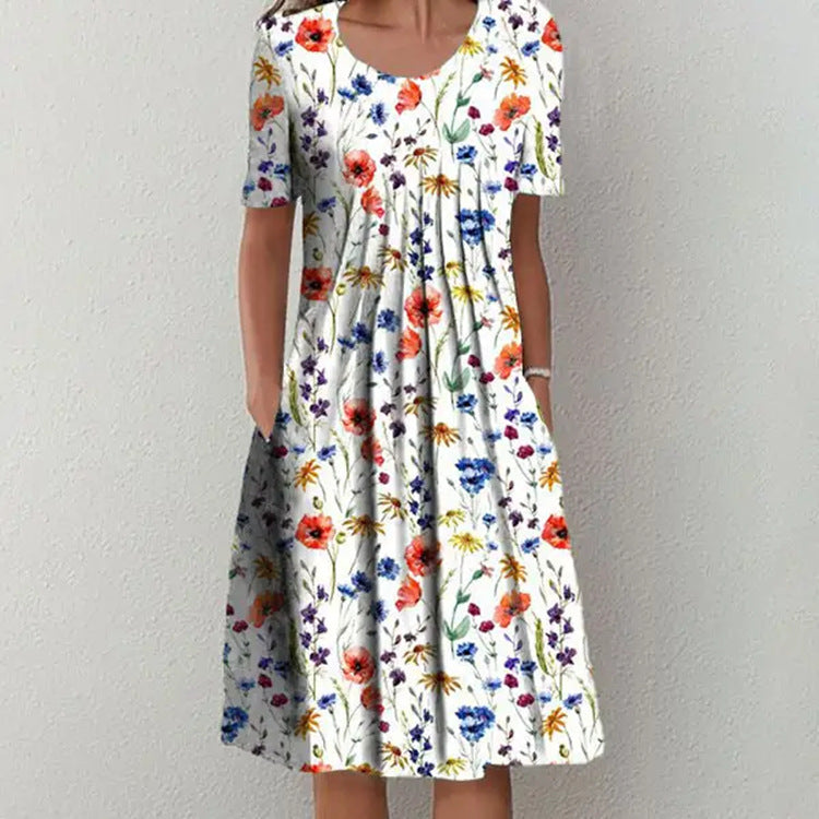 Casual floral dress in white with colorful small flowers, short sleeves, and gathered bodice