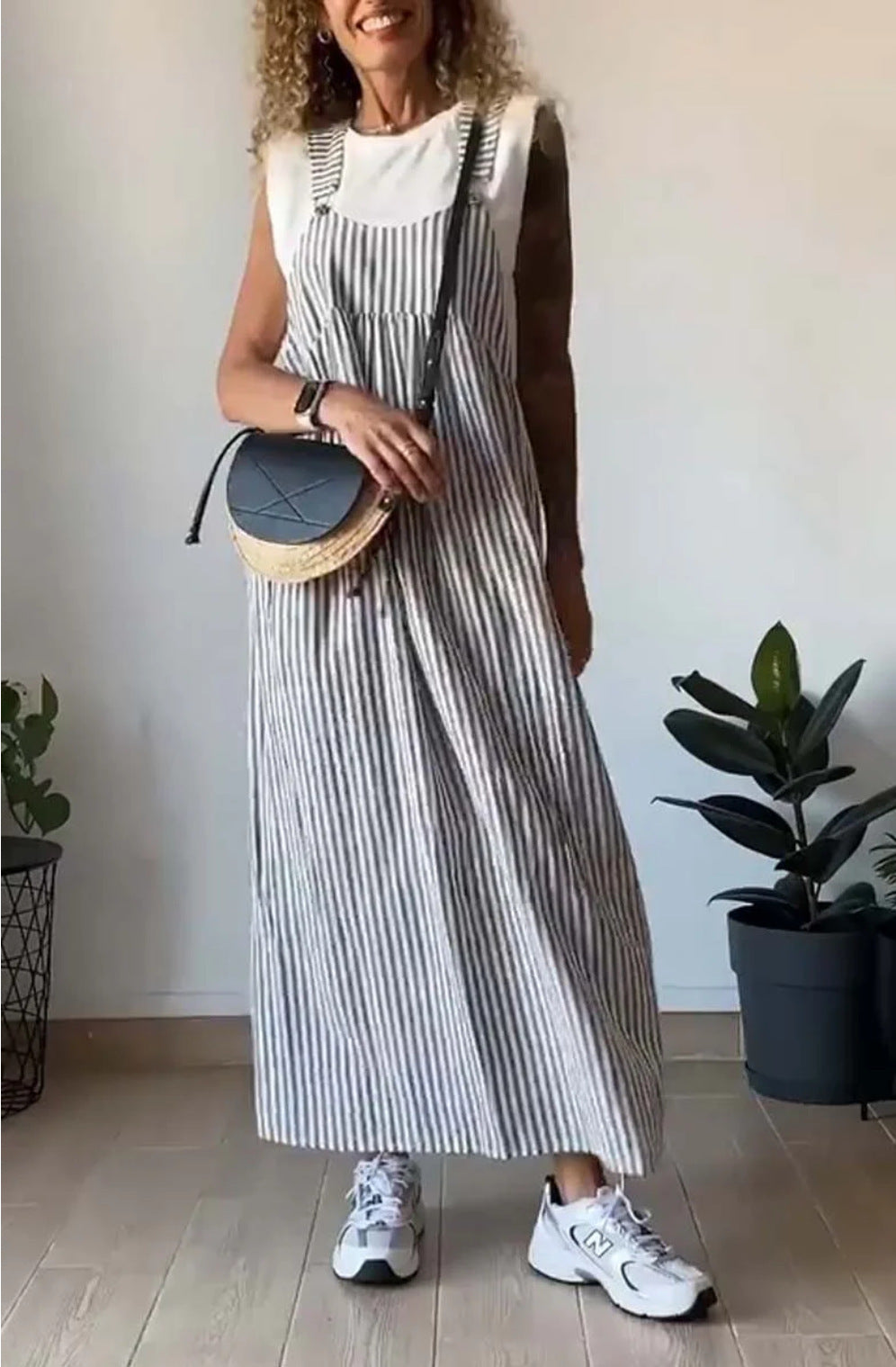 Gray and white striped loose-fit maxi dress with square neckline and sleeveless style