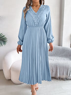 Light blue pleated midi dress with V-neck lace trim and long balloon sleeves
