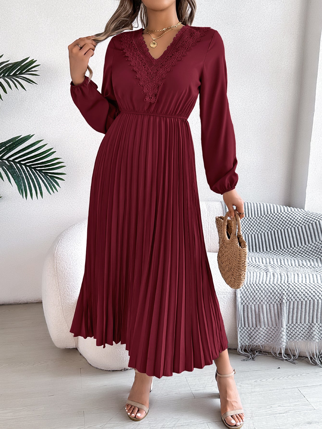 Wine red pleated midi dress with V-neck lace trim and long sleeves, belted waist