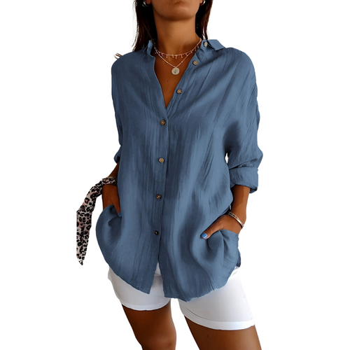 Blue collared button-front blouse with patch pocket and long sleeves, relaxed fit