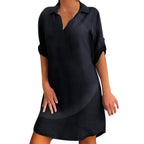 Black cotton blouse dress with collar, V-neck, and three-quarter sleeve length