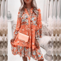 Orange printed long-sleeve tiered dress with V-neck and ruffle hem