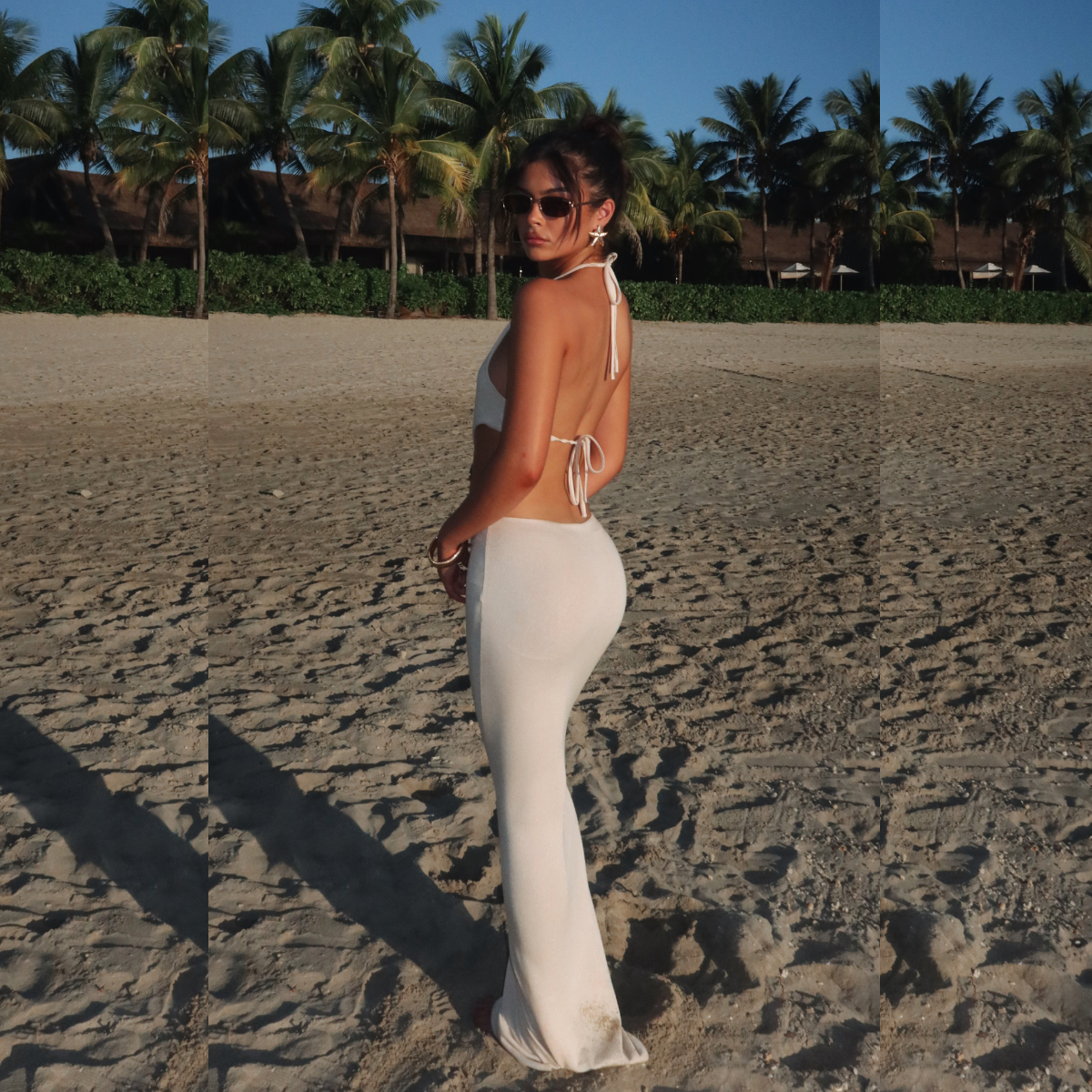 White halter maxi dress with open back and center tie, sleeveless fitted column