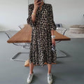 GRUSHA leopard print midi dress with button front, ruffled sleeves, tiered skirt