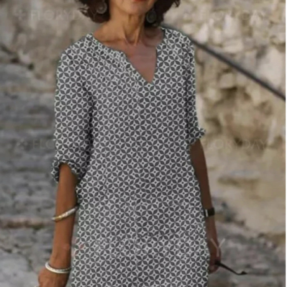 Gray patterned V-neck shift dress with long sleeves, above-knee length