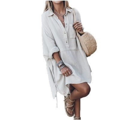 White button-front relaxed loose dress, long sleeves with rolled cuffs and belt