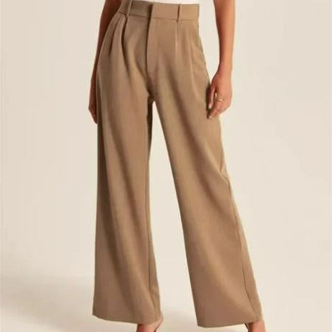 Tan wide-leg summer trousers with high waist and front pleats