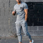 Cotton t-shirt and jogger set, light gray with black chest graphic and drawstring waist