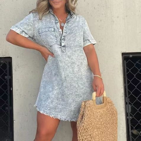 Light blue denim-style casual dress with button placket, short sleeves, and frayed hem