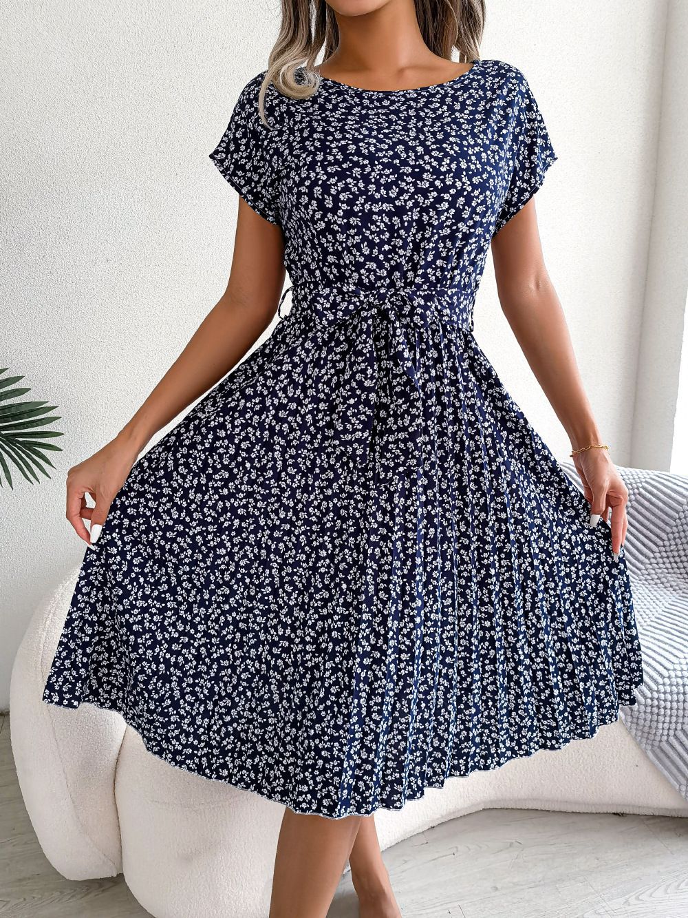 Yola™ navy floral midi dress with short sleeves, round neck, and tied waist