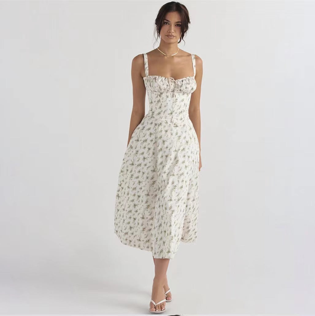 Elegant midi dress in white with small green floral print and fitted bodice