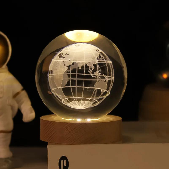 Sterre™ glowing crystal ball with lit globe design on wooden base