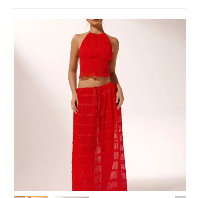 Red tiered halter crop top and layered maxi skirt set