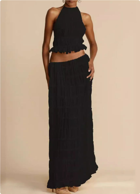 Black tiered halter crop top and layered maxi skirt set