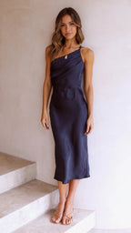 Dark blue satin one-shoulder midi slip dress with draped bodice and fitted skirt