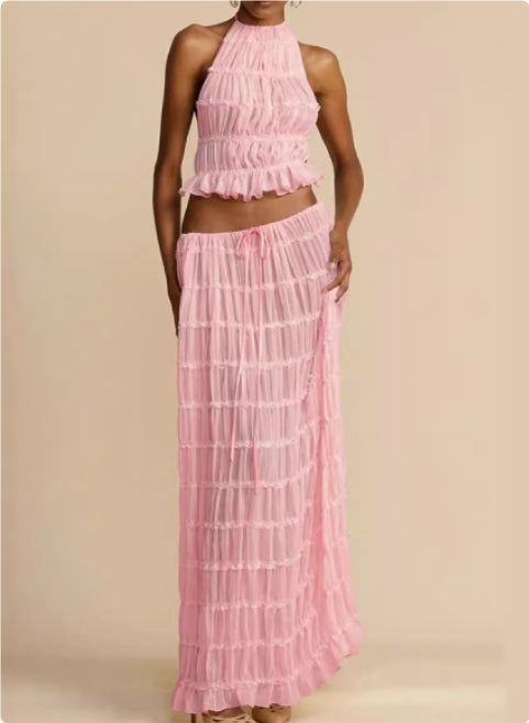 Pink tiered halter crop top and layered maxi skirt set