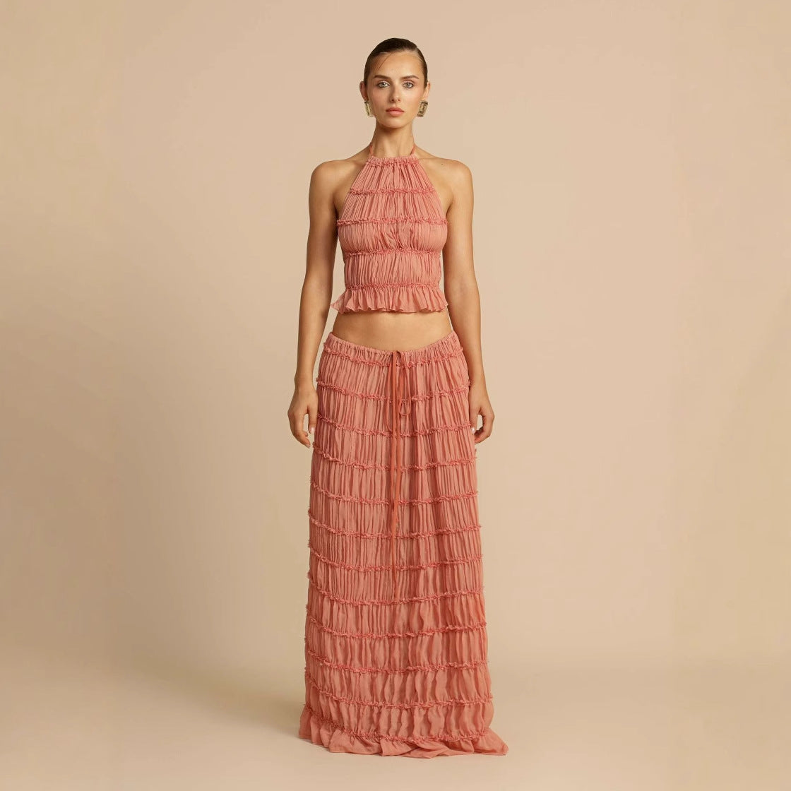 Pink tiered ruffle halter top and tiered maxi skirt set, sleeveless